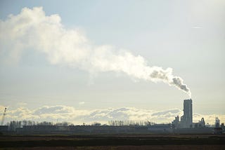 OptimusZ7: Redefining Real-Time Carbon Monitoring with Blockchain and IoT