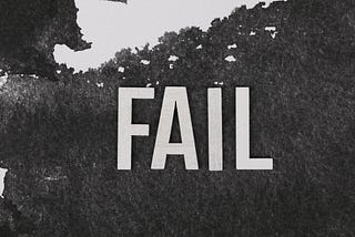 Black and white photo of the word “FAIL”