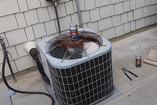 What is the main cause of Rust on AC & how to prevent it?