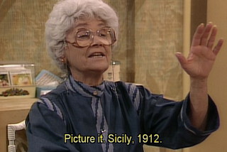Sophia Petrillo hand up saying “Picture it. Sicily. 1912.”