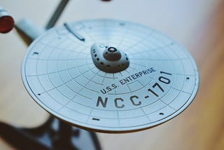 A miniature of the Star Trek starship U.S.S. Enterprise NCC — 1701.