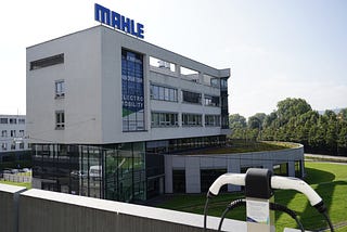 MAHLE headquarters with two chargers in the foreground