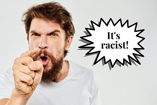 White people is a racist term. Photo of angry man who’s pointing and shouting ”It’s racist!”