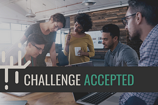 a group of people around a laptop with “Challenge Accepted” overlayed