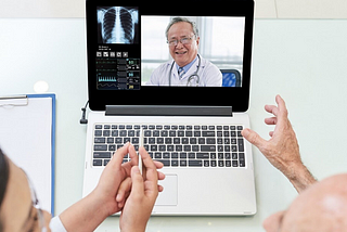 doctors using telemedicine software to consult with patients online