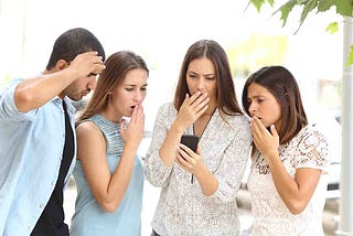 Adults watching negative news on cellphone