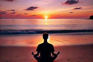 “A person meditating on the beach during a sunset” Image created using Chat GPT AI