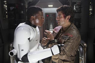 Finn (John Boyega) and Poe Dameron (Oscar Isaac) in Star Wars: Episode VII — The Force Awakens.