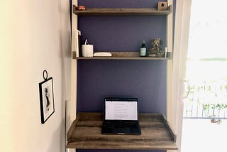 Desk with two shelves, neatly organized