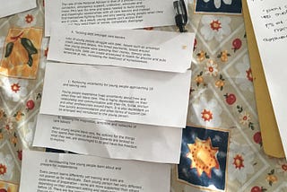 Notes stuck down in order of which areas should be prioritised and which areas should be deprioritised in the discovery.