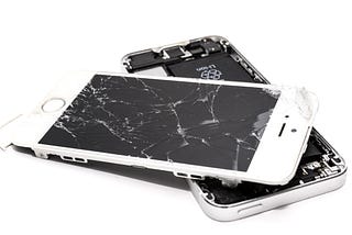 Image of 2 iphones with broken screens