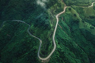 A road winding through the mountains.
