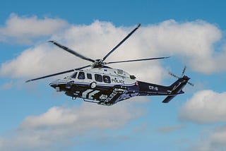 Police helicopter hovering during ICE raid