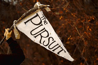 The Pursuit flag in the forest
