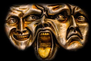 Different human emotions depicted as masks.