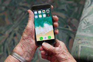 iPhone being held by a senior