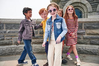 Kids dressed in latest trends. Fall outfits for boys and girls