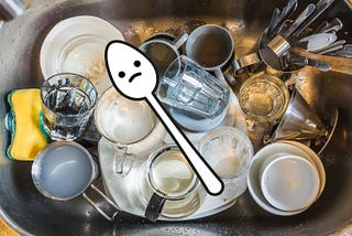 A dirty sink and a sad teaspoon.