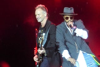 Shaggy and Sting performing together.