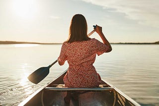 Project life poem- a woman rowing boat