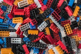 A pile of different colored lego blocks