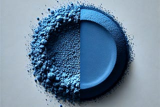 International Klein Blue pigment powder arranged in a circular fashion, divided in half down the middle.