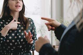 woman at work having a conflict with her lady boss