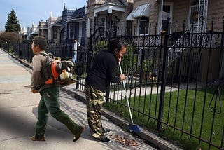 Local Landscaper Pretends to Work by Carrying Around Running Motor