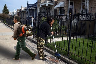 Local Landscaper Pretends to Work by Simply Carrying Around Running Motor