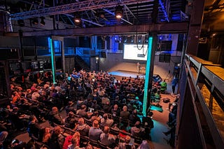 The main conference room of the Kubernetes Community Days 2023 in Amsterdam