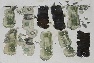 Damaged, recovered bills from the DB Cooper ransom money.