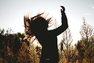 Woman dancing in nature