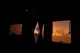 Sunrise taken through my caravan windows.