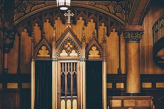 Image of a confession booth in a church