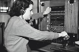 Woman operating a switchboard