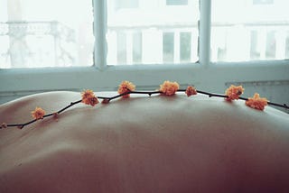 massage-orange-flowers-on-back