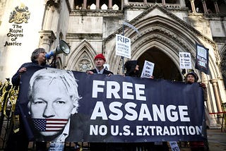 Joe Biden should pardon Julian Assange under the First Amendment
