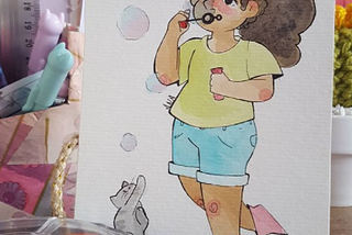 ilustração de uma menina soltando bolinhas de sabão e um gatinho tentando pegar as bolinhas.