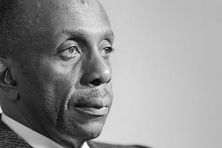 black and white photo of Howard Thurman’s profile