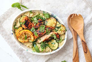 Quinoa and zucchini tabbouleh with harissa chicken, by FIT & NU™.