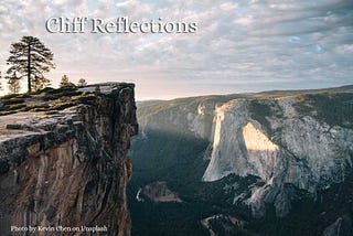 Cliff overlooking land below — text “Cliff reflections”