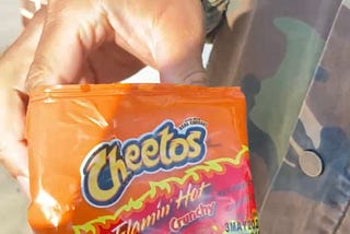 The Meaning Behind “Ode to Flaming Hot Cheetos”