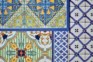 A wall of handpainted Mexican ceramic tiles in various colors