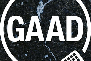 White “GAAD” text in a circle on a textured black background. A keyboard icon is in the corner, suggesting a tech theme.