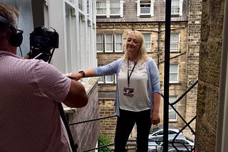 Author Caroline Mitchell being interviewed on camera