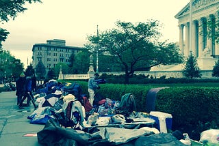 At the Supreme Court, waiting for love  —  or money.