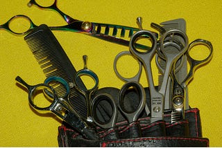 How often should hairdressing scissors be sharpened?