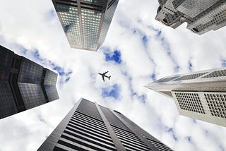 Plane over a city