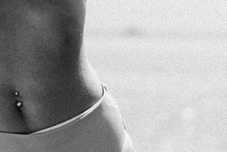 Belly Button Ring’s Plea To 36-Year-Old Woman Still Wearing Her: “It’s Time To Let Me Go.”