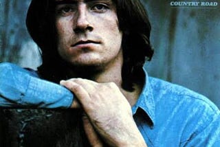 album cover featuring a very serious looking James Taylor in his younger years.